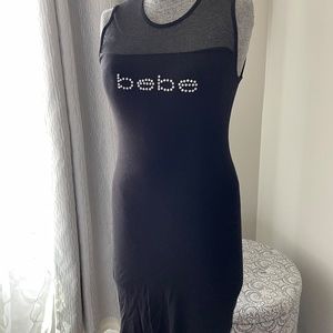 Black Bebe stretch dress. Sheer neckline. Sz M